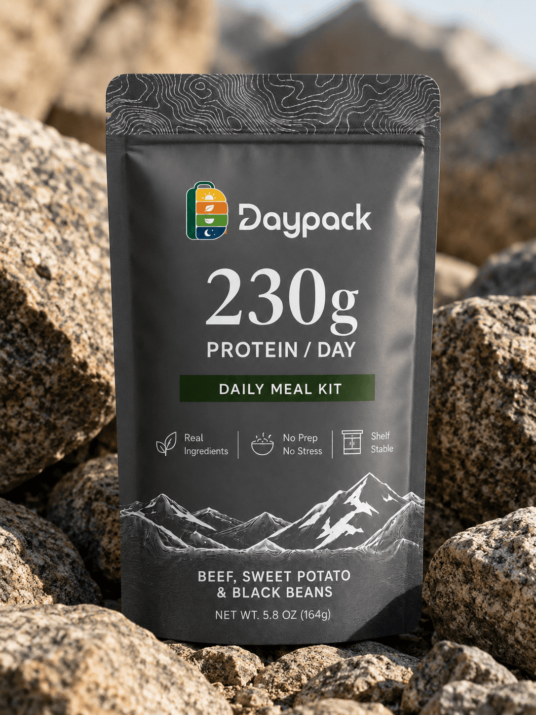 Daypack 230g daily meal kit pouch in dark granite among sunlit boulders.